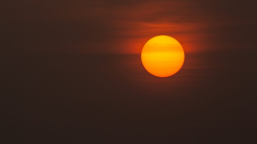 low-light photo of sun
